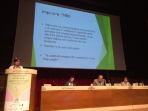 A woman giving a powerpoint presentation