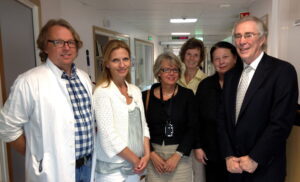 Four women and two men in a hospital