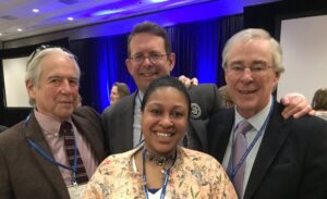 Three men and a woman