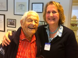 A woman and Dr. Barry Brazelton